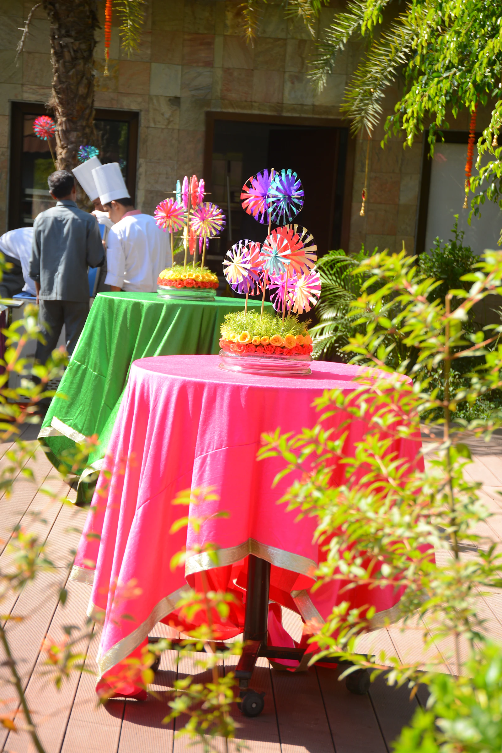 team members celebrating product launch with cake confetti
