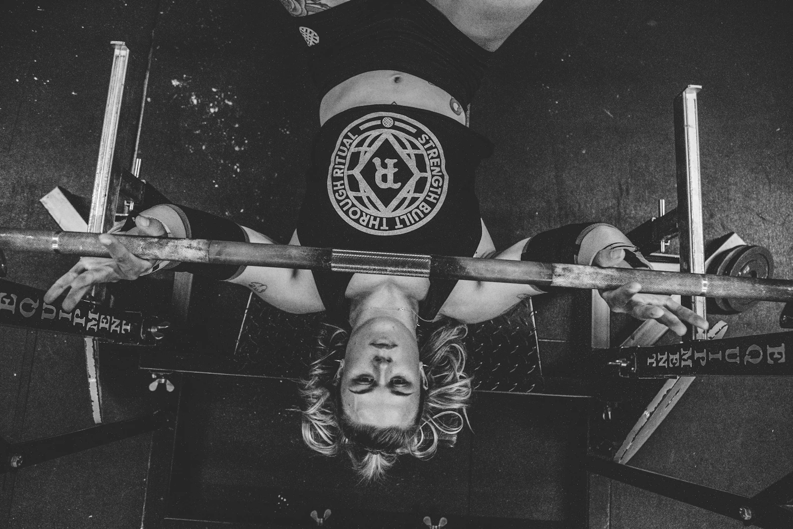 Client celebrating hitting a new personal best on bench press