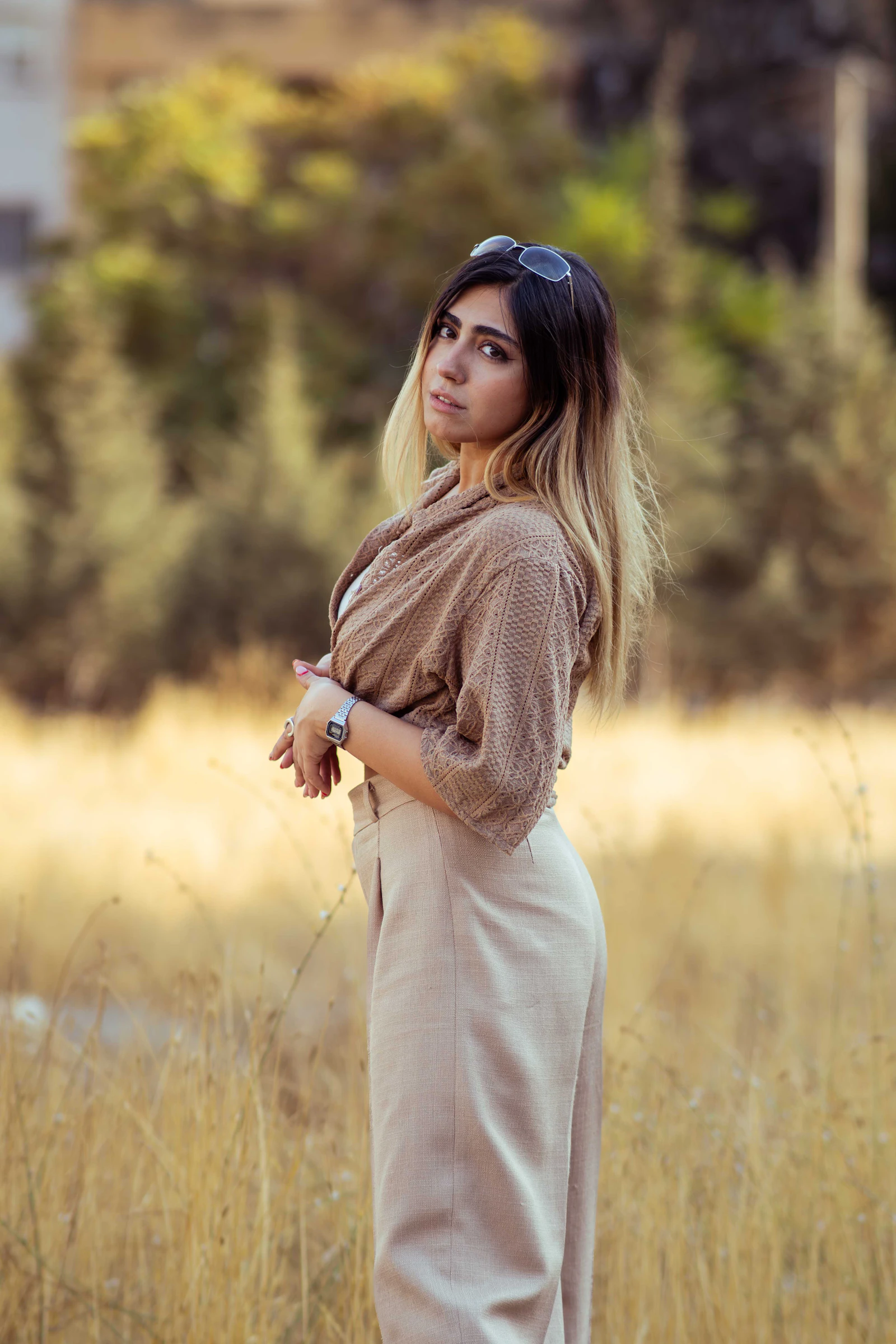 confident creative woman product designer portrait studio natural light warm background