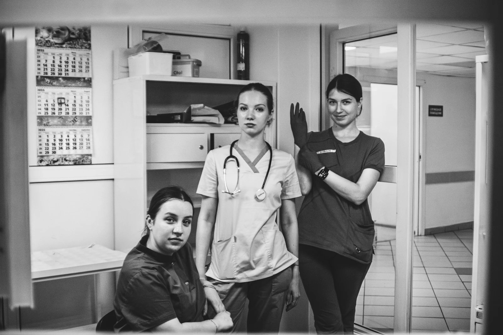 Dr. [Clinic Name] and team members in the modern dental practice interior