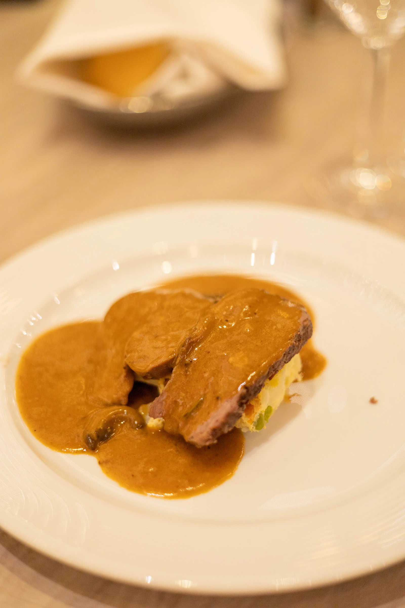 pan-seared foie gras cherry compote fine dining plate gold rim